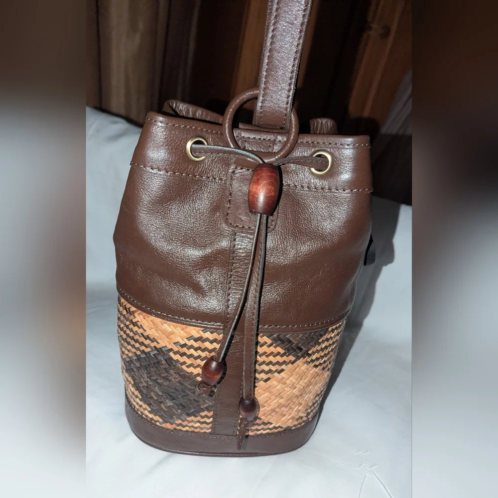 The Sak Brown Weave and Leather Backpack.